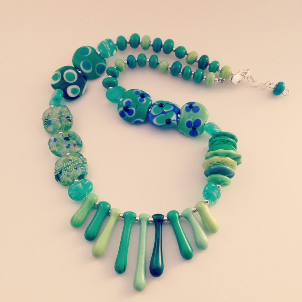 Beautiful Green Necklace with a splash of blue (handmade glass beads)