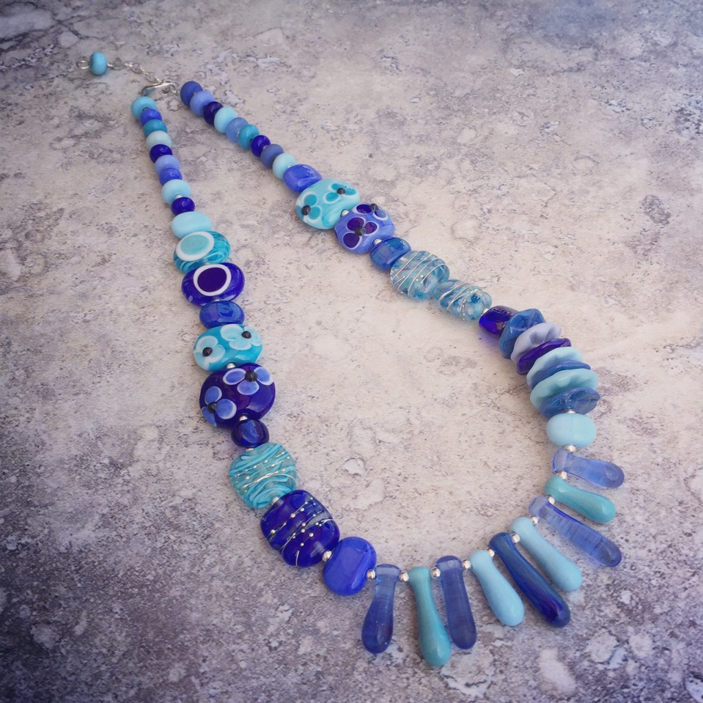 Stunning necklace, made with a selection of handmade glass beads by Julie Frahm