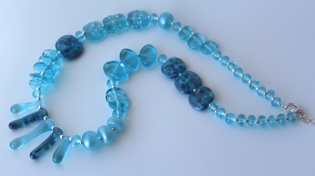 Asymmetrical necklace - beads made from a Bombay Sapphire Gin bottle