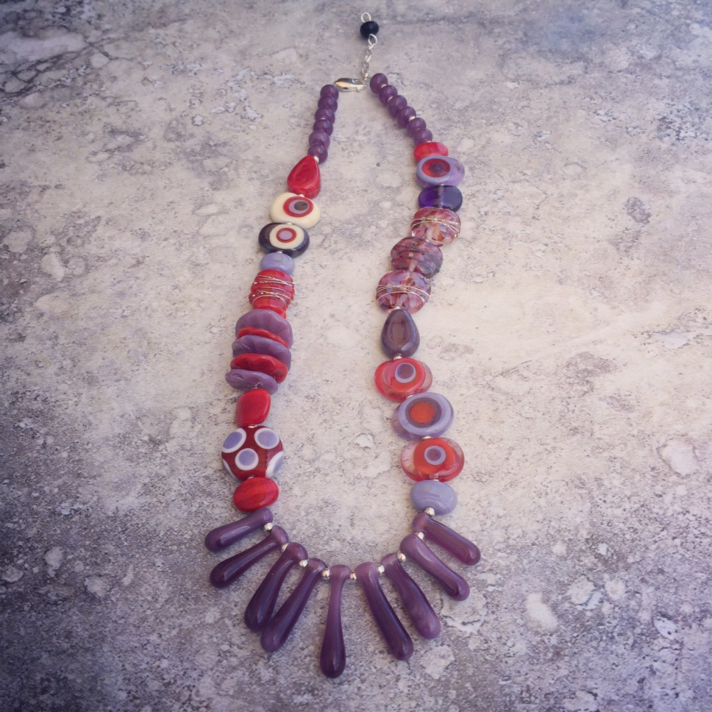 Gorgeous red and purple handmade glass bead necklace by Julie Frahm