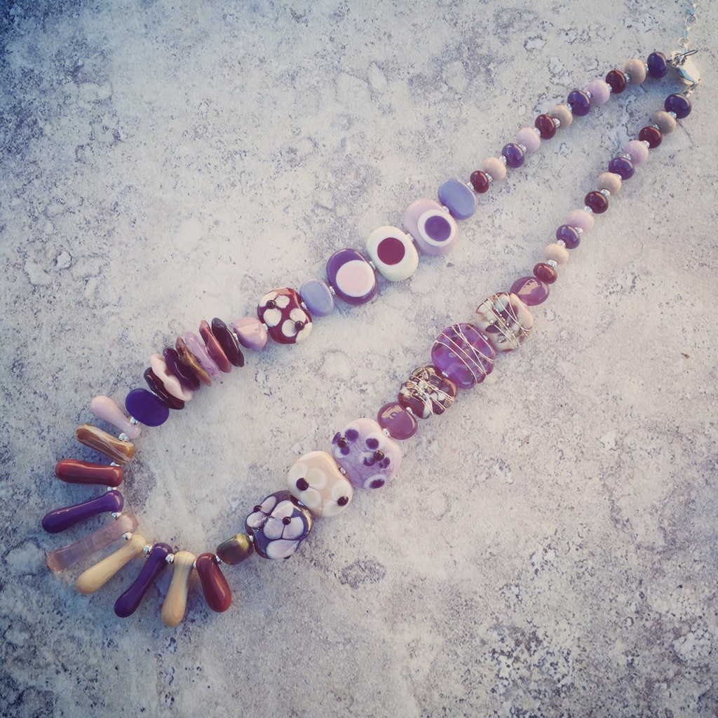 Combining purple and brown handmade glass beads by Julie Frahm