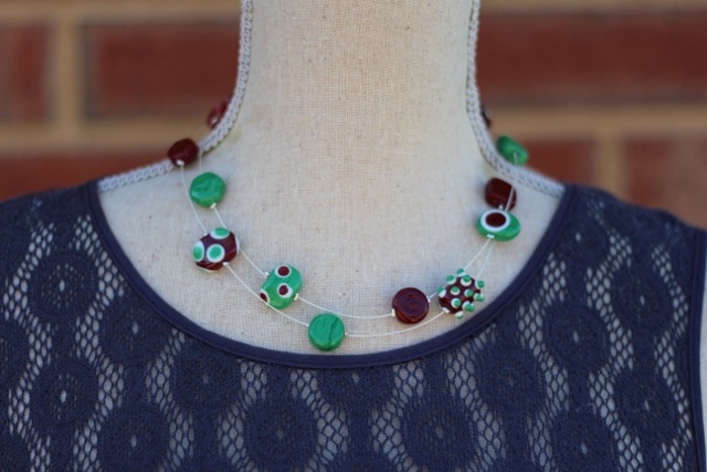 Long brown and green handmade glass bead necklace by Julie Frahm - worn doubled