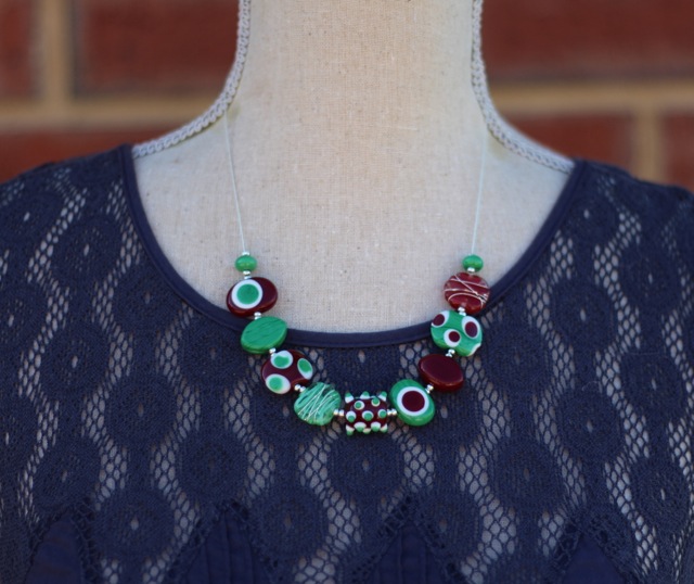 Short brown and green handmade glass bead necklace by Julie Frahm