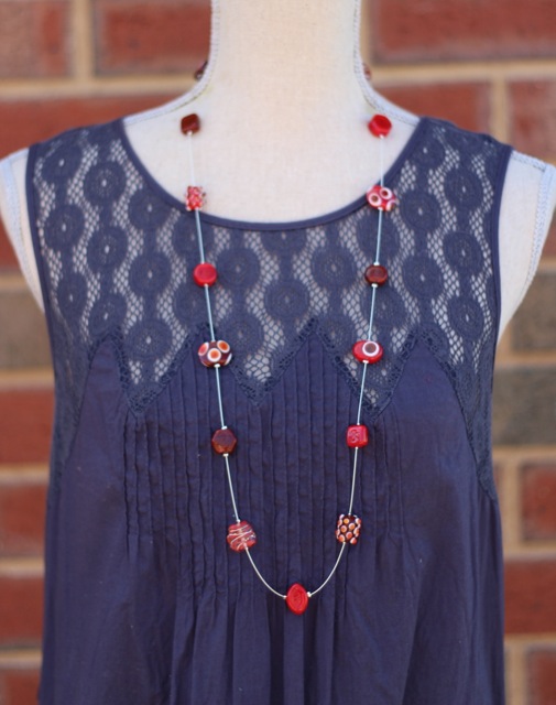 Beautiful long brown and red necklace, handmade glass beads by Julie Frahm