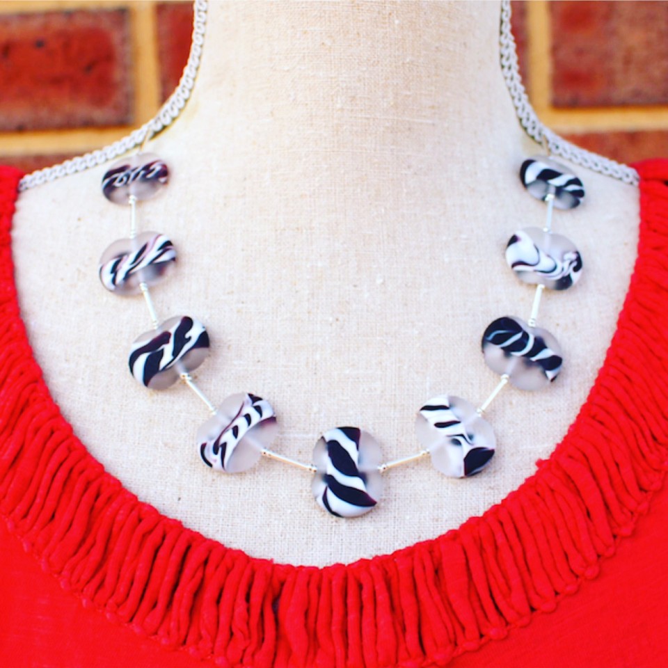 Black and White etched glass necklace by Julie Frahm, looks great on RED!