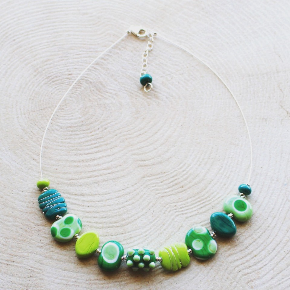 Mixed green glass necklace.