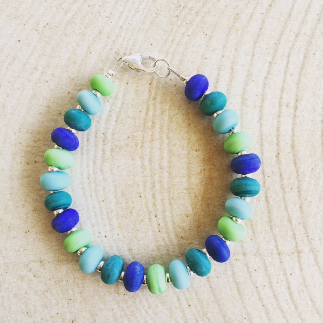 Etched blue/green handmade glass bead bracelet