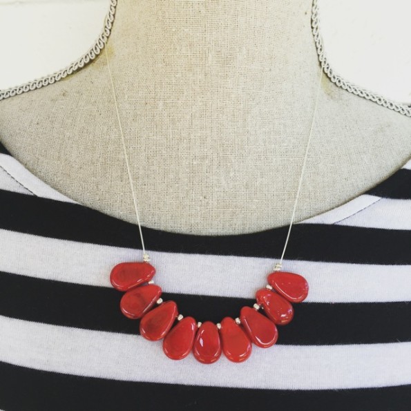 Red handmade glass beads on silver wire necklace