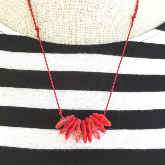 Red Flower disk necklace on silk cord