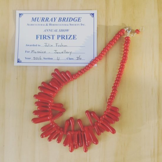 First prize - red necklace with handmade glass beads by Julie Frahm