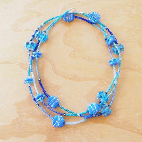 long blue glass bead necklace