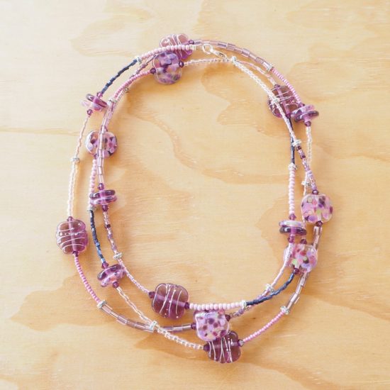 long purple glass bead necklace