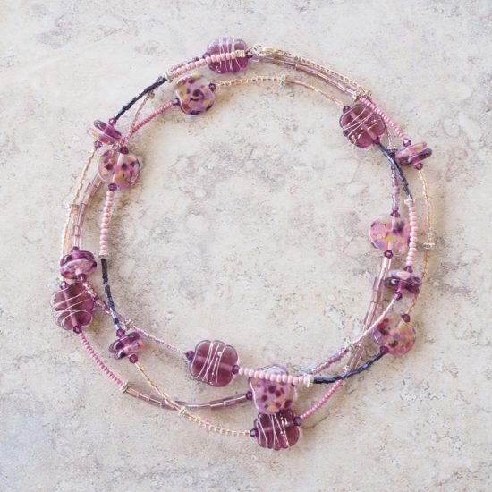 long purple glass bead necklace