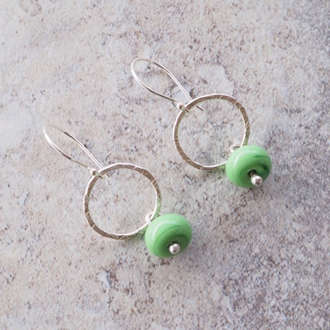 green and silver earrings