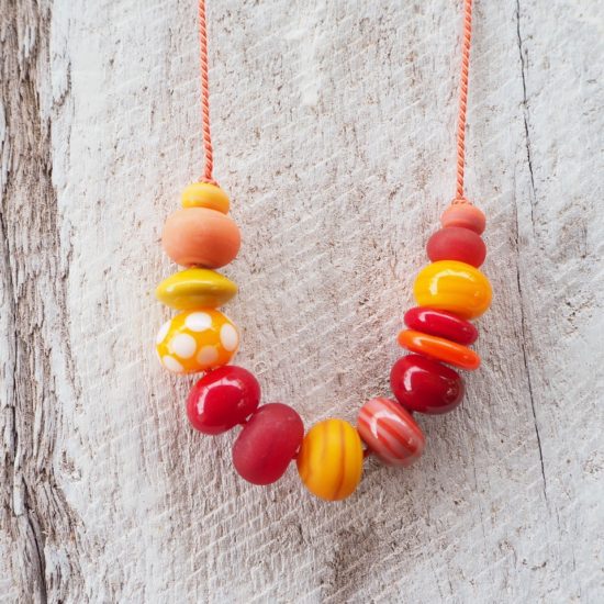 orange handmade glass bead necklace