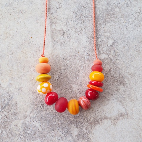 orange handmade glass bead necklace