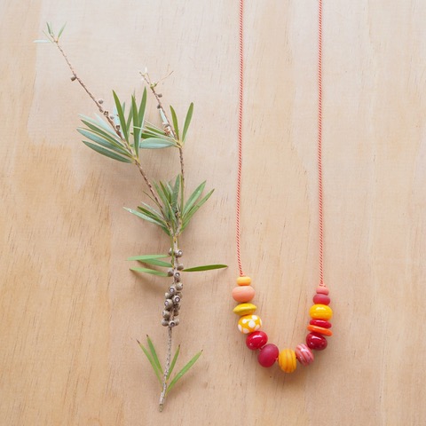 orange handmade glass bead necklace