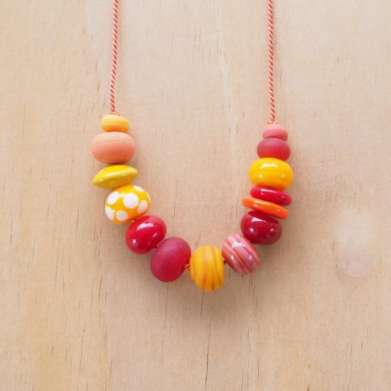 orange handmade glass bead necklace