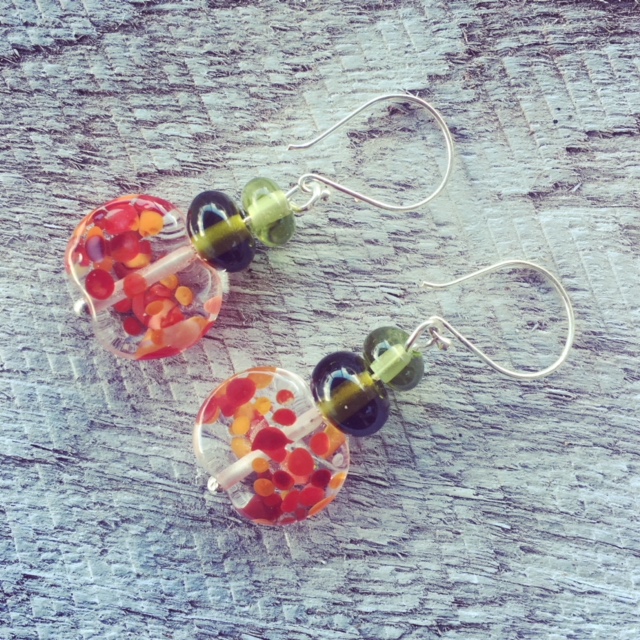 Handmade recycled glass bead earrings | red beads made from a tonic water bottle, green beads from wine bottles.