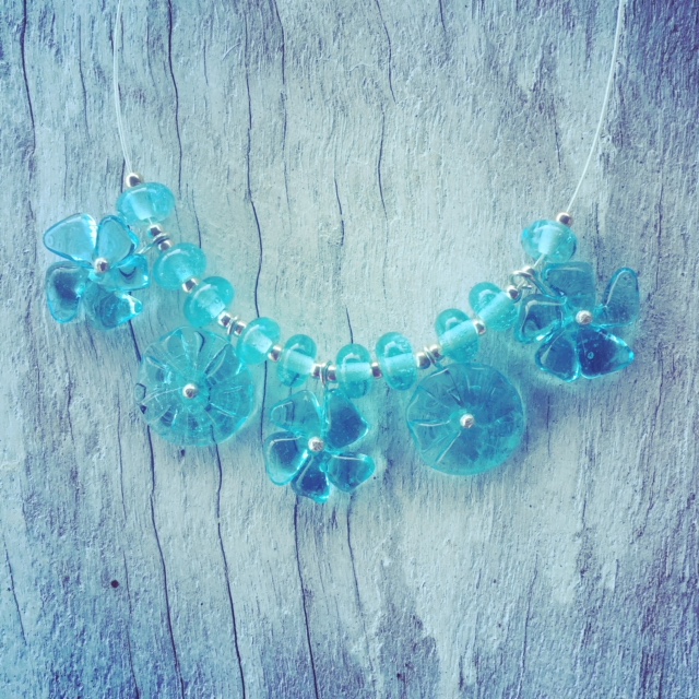Recycled glass necklace | glass flower necklace made from a Bombay Sapphire Gin bottle