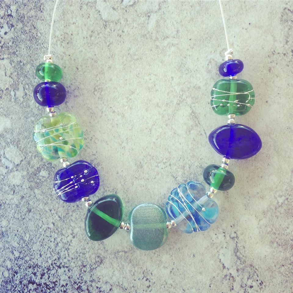 Recycled glass jewellery | blue and green glass beads made from gin, vodka and wine bottles.