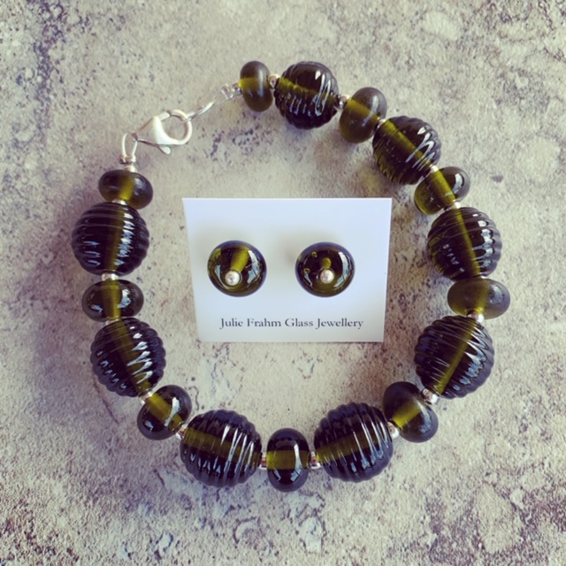 Recycled glass jewellery | beads featured in the bracelet and stud earrings are from a Stones Green Ginger Wine bottle 