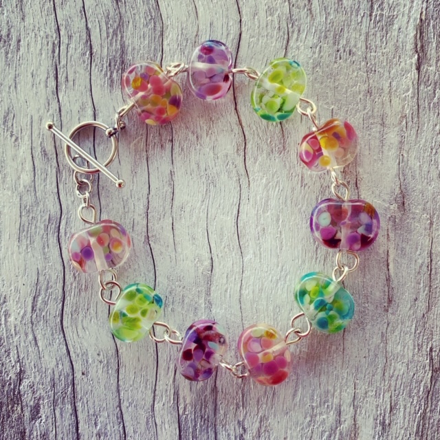 Recycled glass beads | bracelet made from a wine bottle and decorated with pinks and purples and greens 