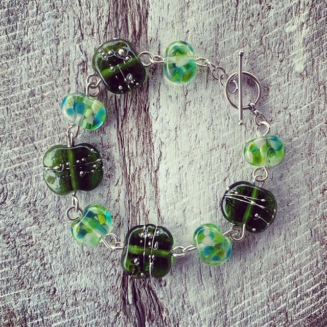 Recycled glass jewellery | green beads made from champagne and wine bottles 