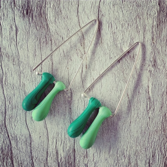 Long green triangle earrings