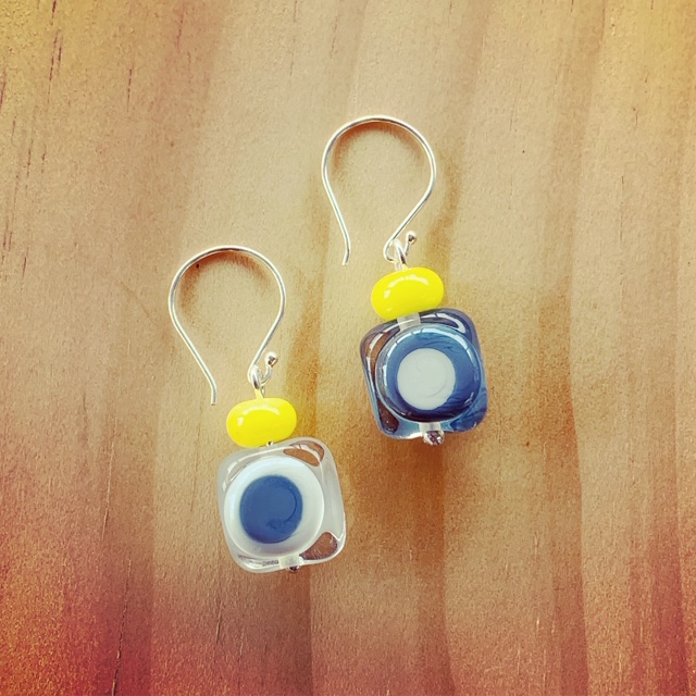 Grey earrings with a pop of yellow