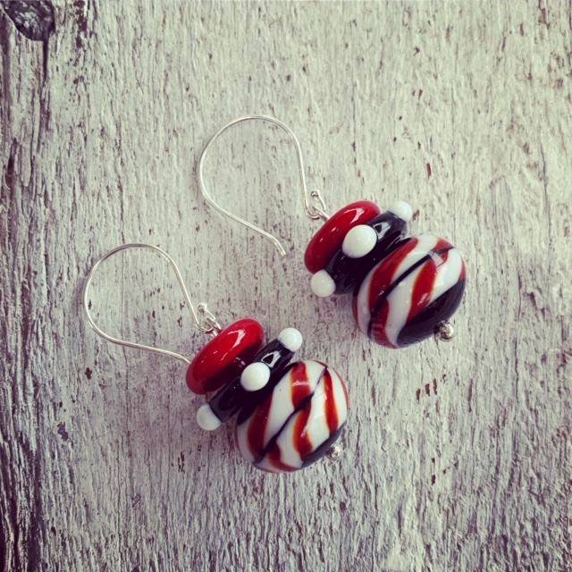 red, black and white earrings 