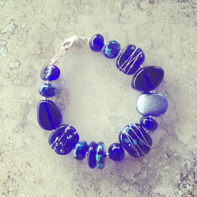 recycled glass bracelet featuring beads made from a Skyy Vodka bottle