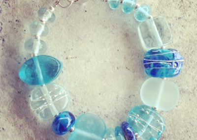 Recycled glass bracelet | featuring beads made from wine and gin bottles.