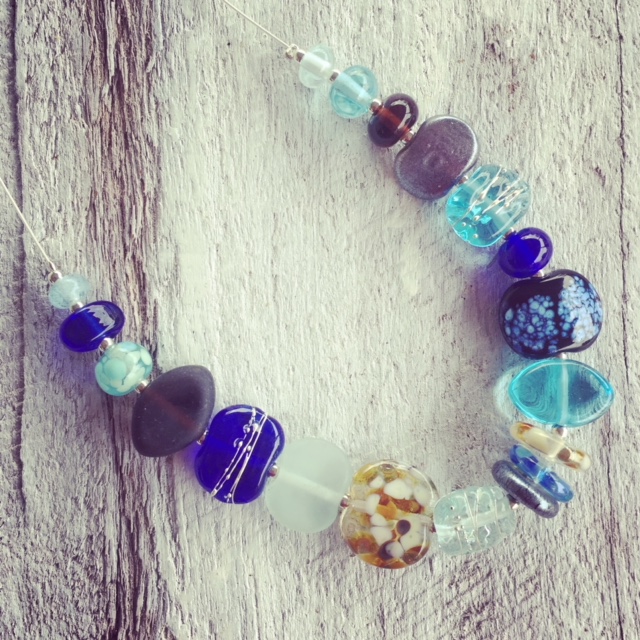 Recycled glass necklace | blue and brown beads made from various recycled glass objects