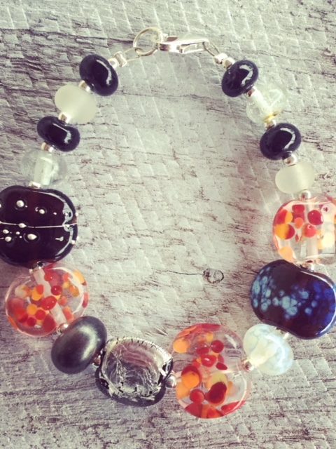 Recycled glass bead bracelet | beads made from gin and tonic water bottles in classic red/black/white colour combination