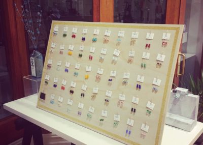 Recycled glass earrings | a mix of earrings on display at T'Arts in Adelaide