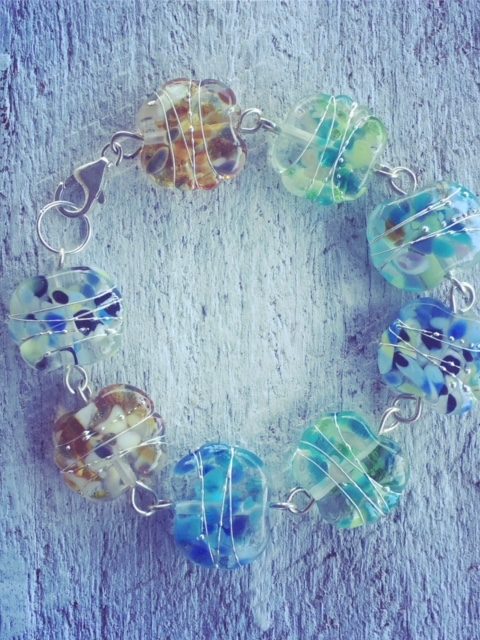 Recycled glass beads | the beads in this bracelet were made from a wine bottle