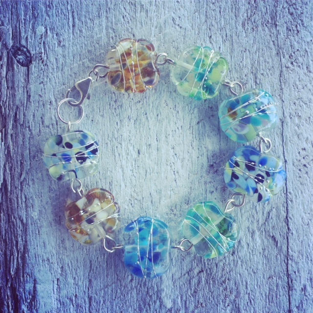 Recycled glass beads | the beads in this bracelet were made from a wine bottle