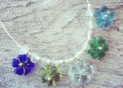Recycled glass necklace | featuring pretty flower beads from vodka, wine and gin bottles