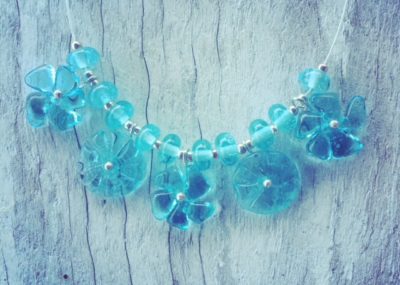 Recycled glass necklace | glass flower necklace made from a Bombay Sapphire Gin bottle