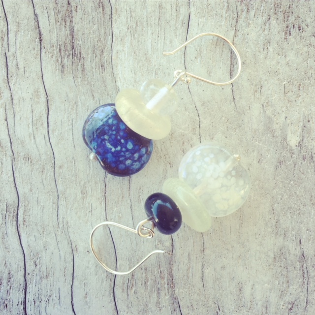 Recycled glass earrings | this mix-match pair of earrings features beads made from a Hendricks Gin and Fever-Tree tonic water bottle