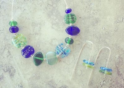 Recycled glass jewellery | blue and green glass beads made from gin, vodka and wine bottles.