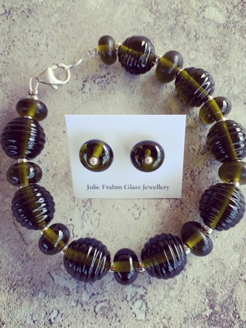 Recycled glass jewellery | beads featured in the bracelet and stud earrings are from a Stones Green Ginger Wine bottle