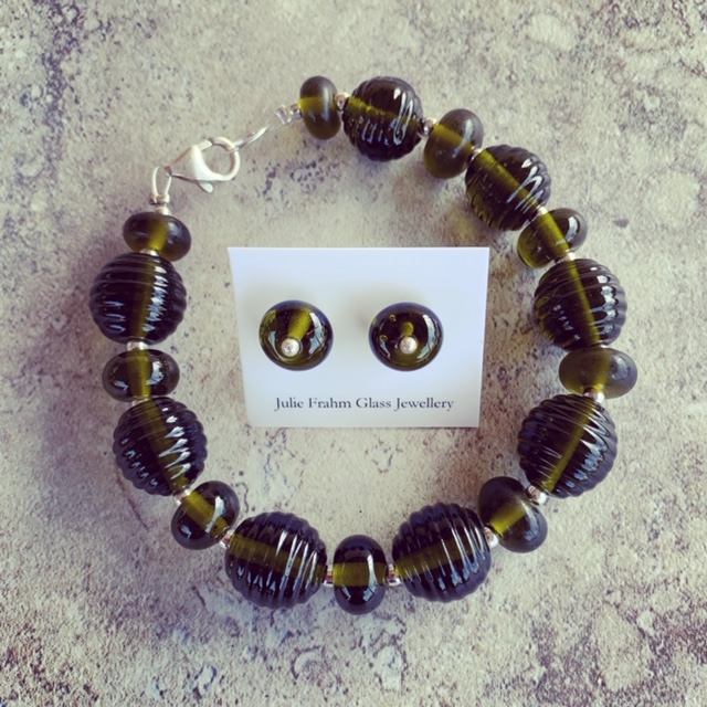 Recycled glass jewellery | beads featured in the bracelet and stud earrings are from a Stones Green Ginger Wine bottle