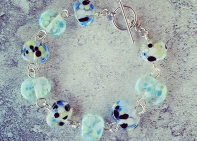 Recycled glass bracelet | beads made from a wine bottle and decorated with smashed up glass