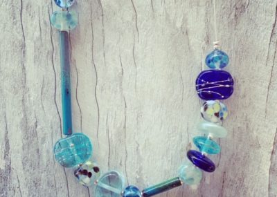 Recycled glass necklace | recycled glass beads made from assorted glass like wine, gin and vodka bottles.