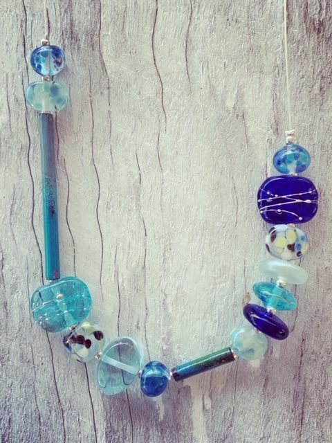 Recycled glass necklace | recycled glass beads made from assorted glass like wine, gin and vodka bottles.