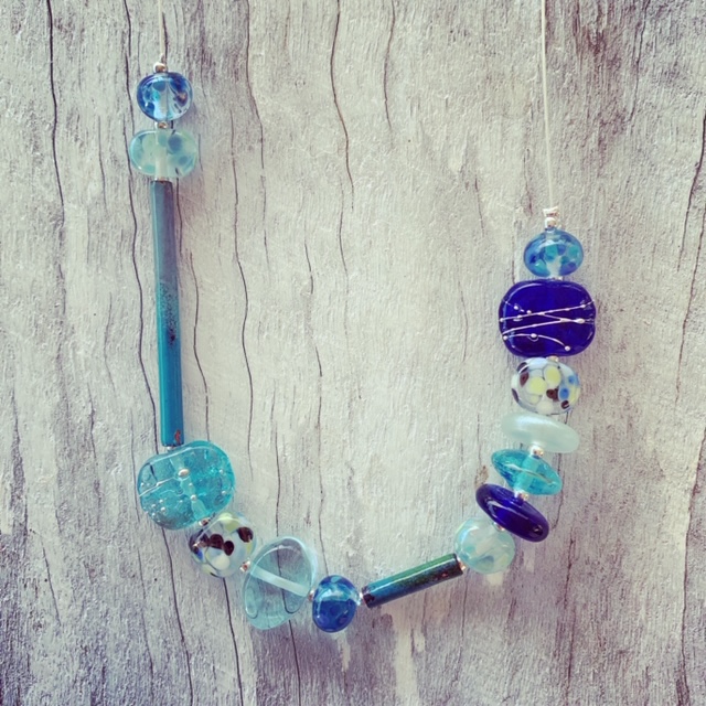 Recycled glass necklace | recycled glass beads made from assorted glass like wine, gin and vodka bottles.