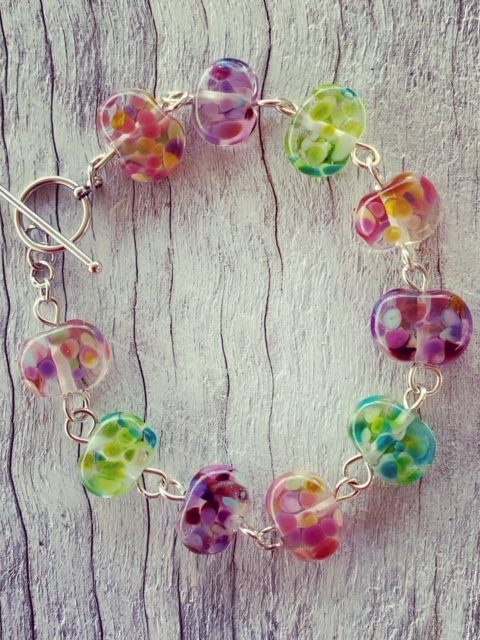 Recycled glass beads | bracelet made from a wine bottle and decorated with pinks and purples and greens