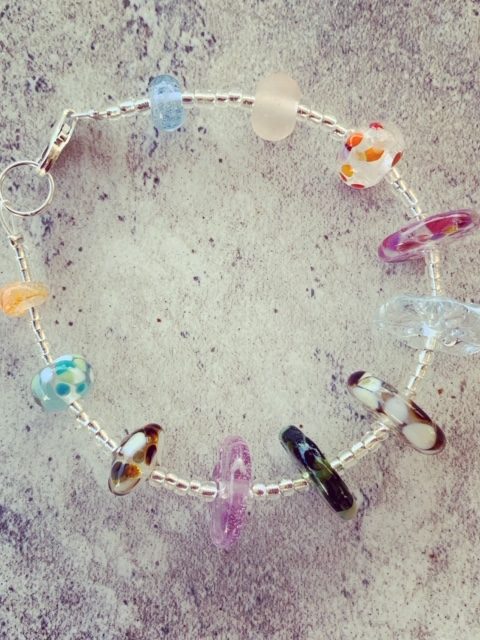 Recycled glass bracelet | beads made from a mix of recycled glass objects